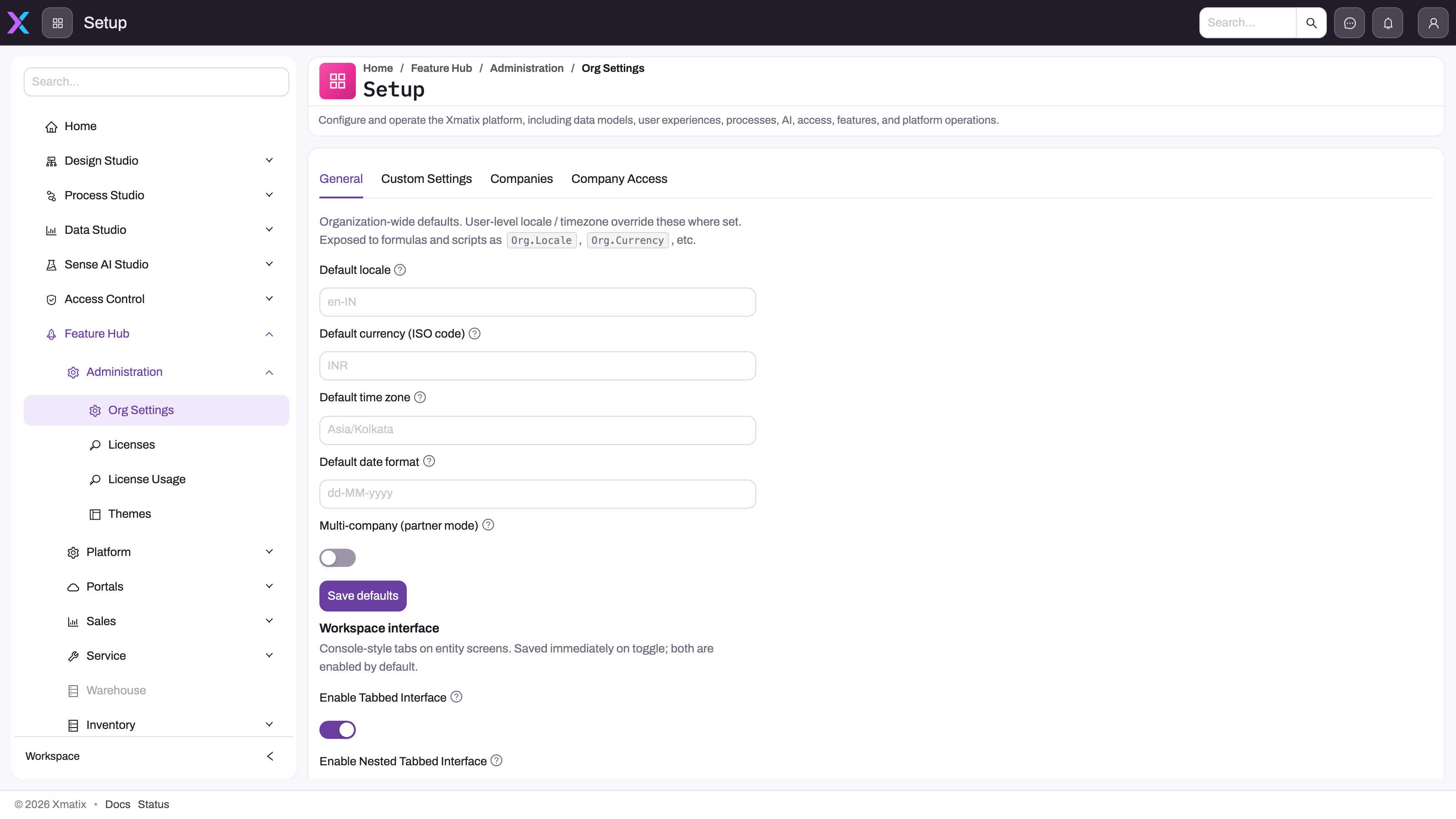 Org Settings under Setup → Feature Hub → Administration, General tab: default locale, currency, time zone and date format fields, the Multi-company (partner mode) switch turned off, and the Workspace interface toggles; tabs for Custom Settings, Companies and Company Access