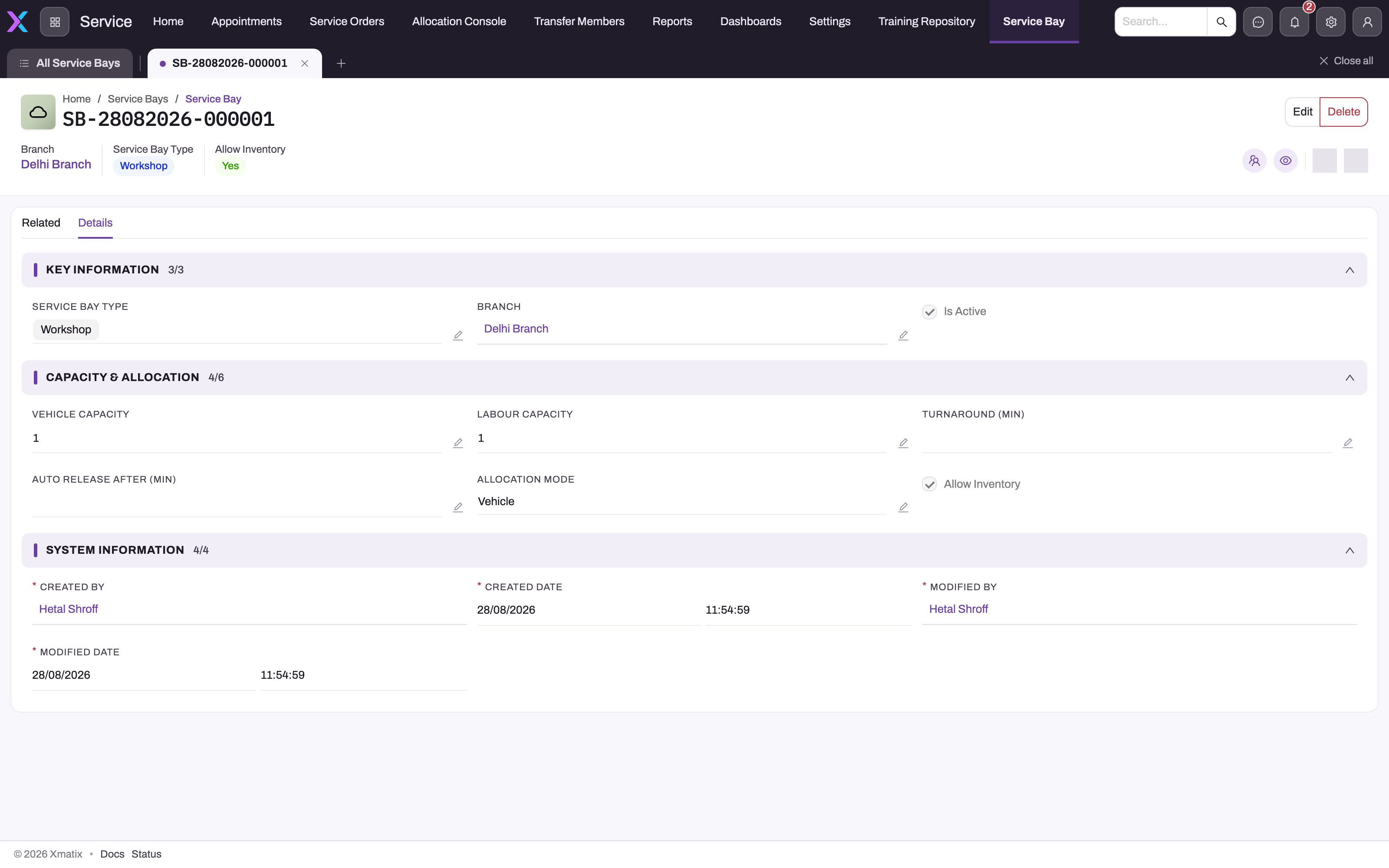 Saved Service Bay record with Edit and Delete actions, header statistics for Branch, Service Bay Type and Allow Inventory, and the Details tab showing Key Information, Capacity & Allocation and System Information