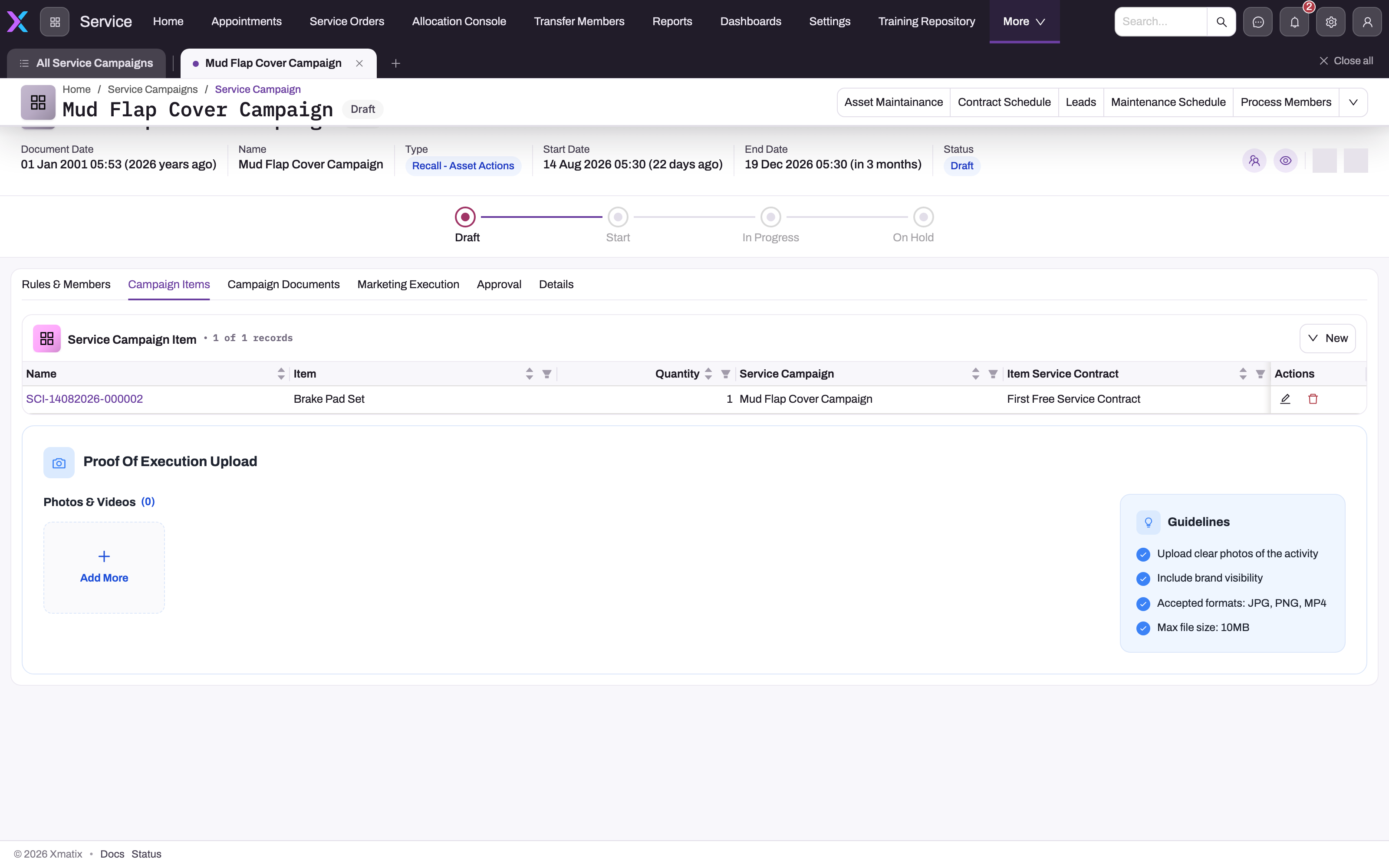 Service campaign record on the Campaign Items tab showing one Service Campaign Item row (Brake Pad Set, quantity 1, First Free Service Contract) with a New button, the processing actions in the header and the Draft-Start-In Progress-On Hold status strip