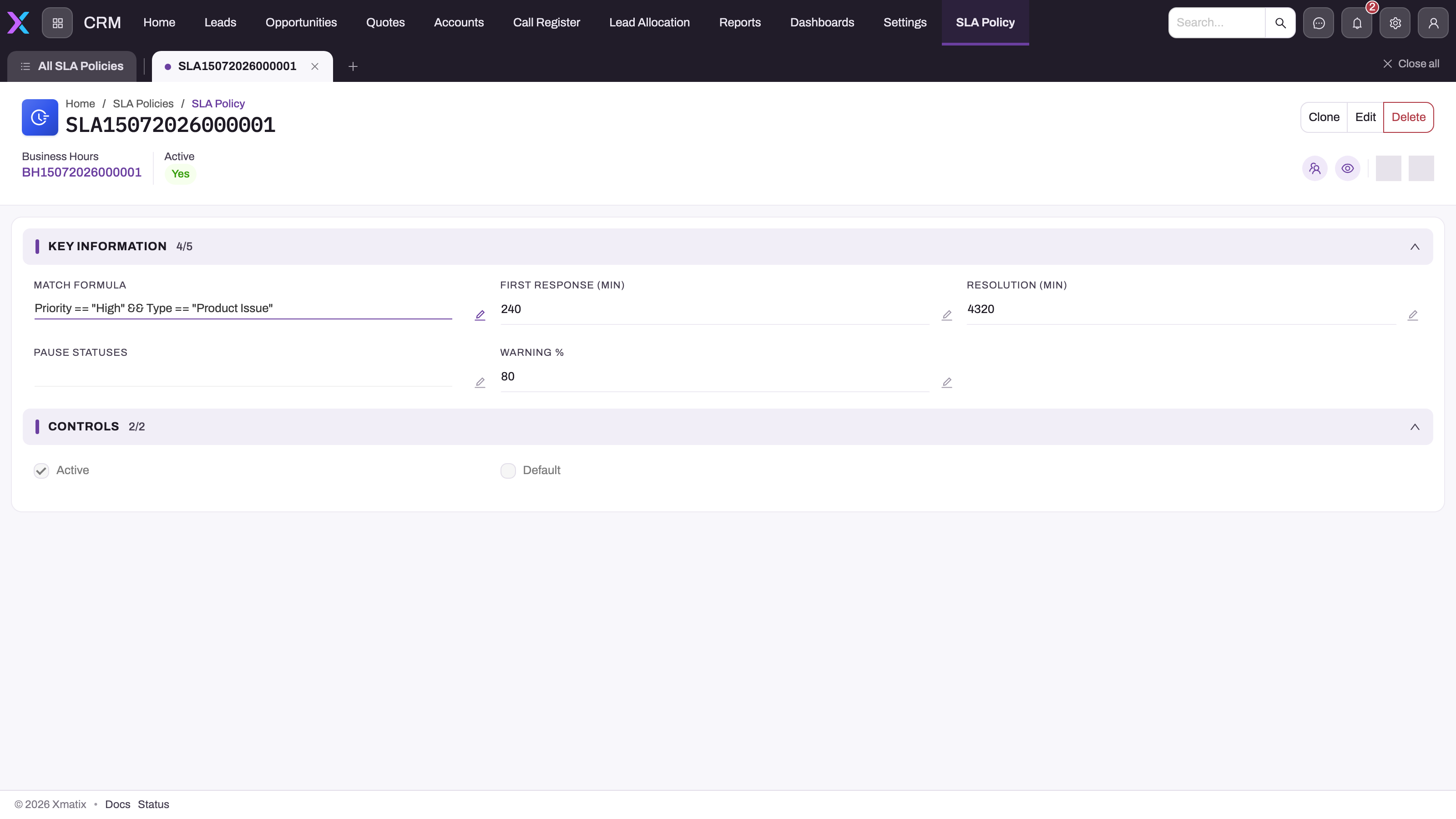 SLA policy record showing Key Information (match formula, first response and resolution minutes, pause statuses, warning percentage) and Controls (Active, Default), with Business Hours in the header